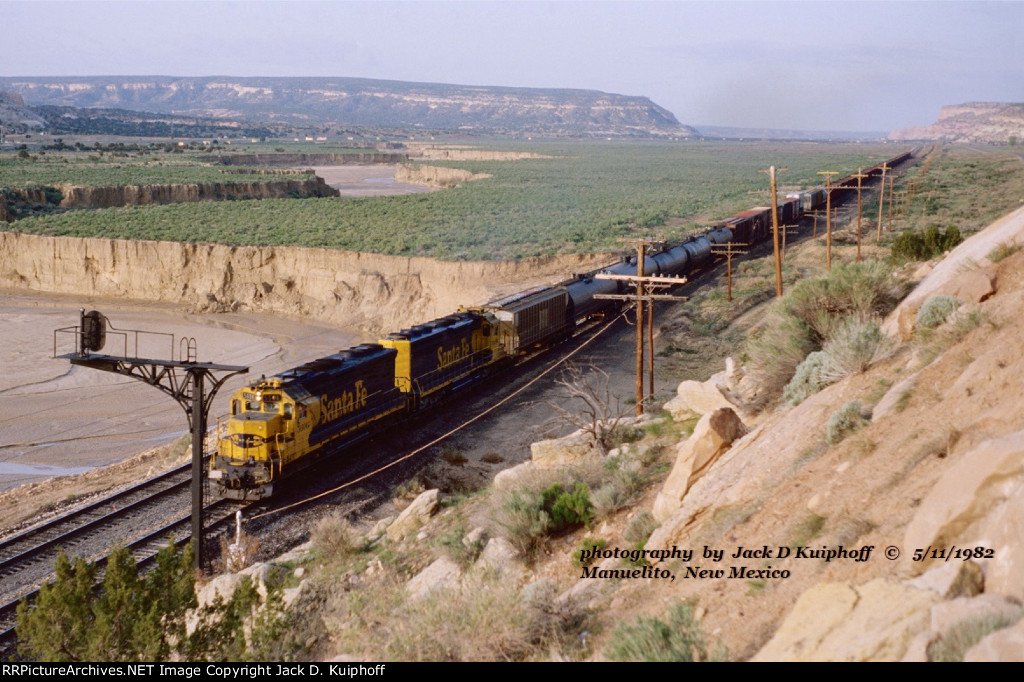 Santa Fe, AT&SF SD45 5606 leads an eastbound freight at Manuelito, New Mexico. May 11, 1982. 